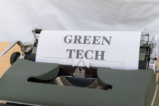 Vintage typewriter displaying the text 'Green Tech', symbolizing eco-friendly innovations.